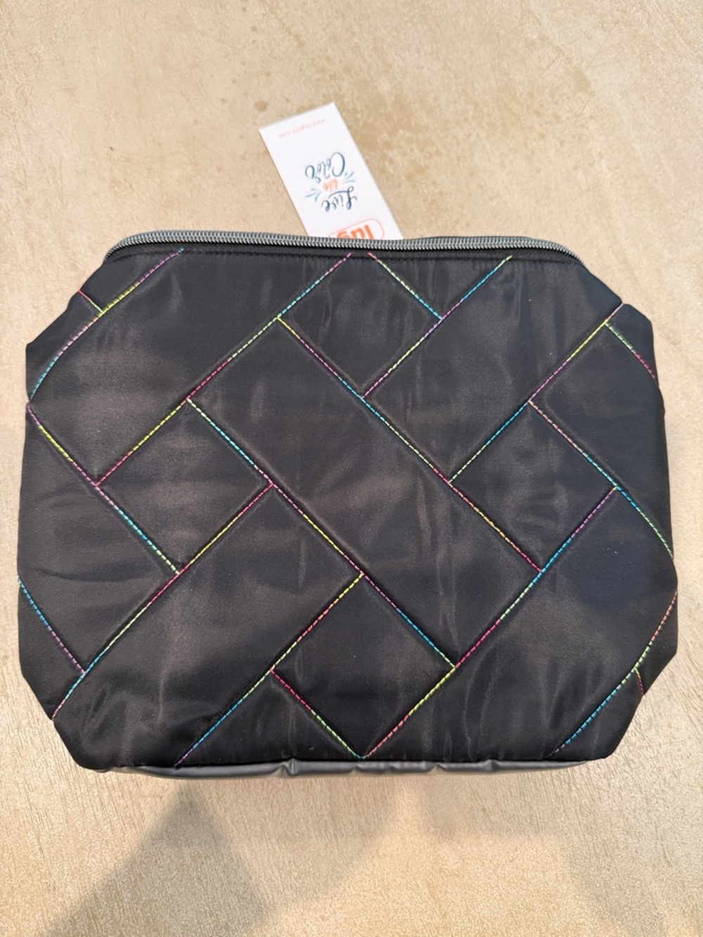 lug Black Quilted Cosmetic Bag with Multicolor Stitching